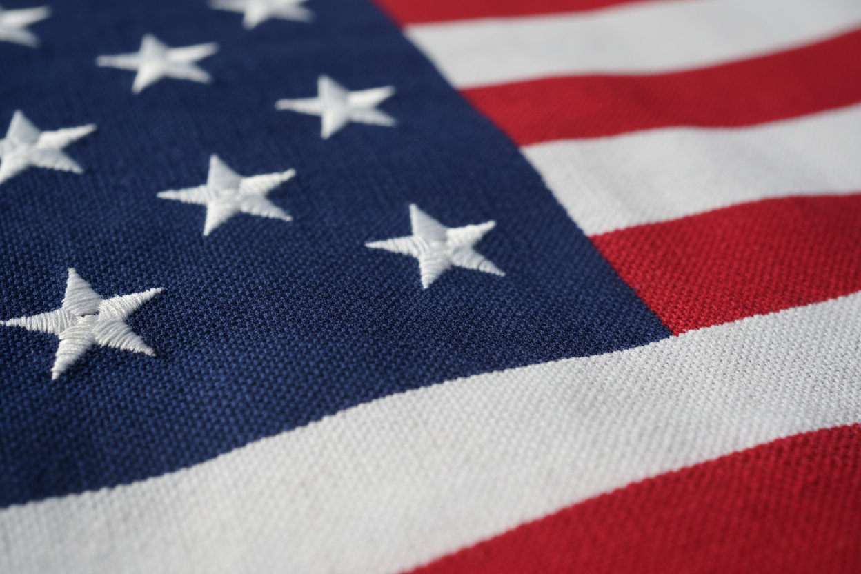 Close-up of an American flag with stars and stripes.